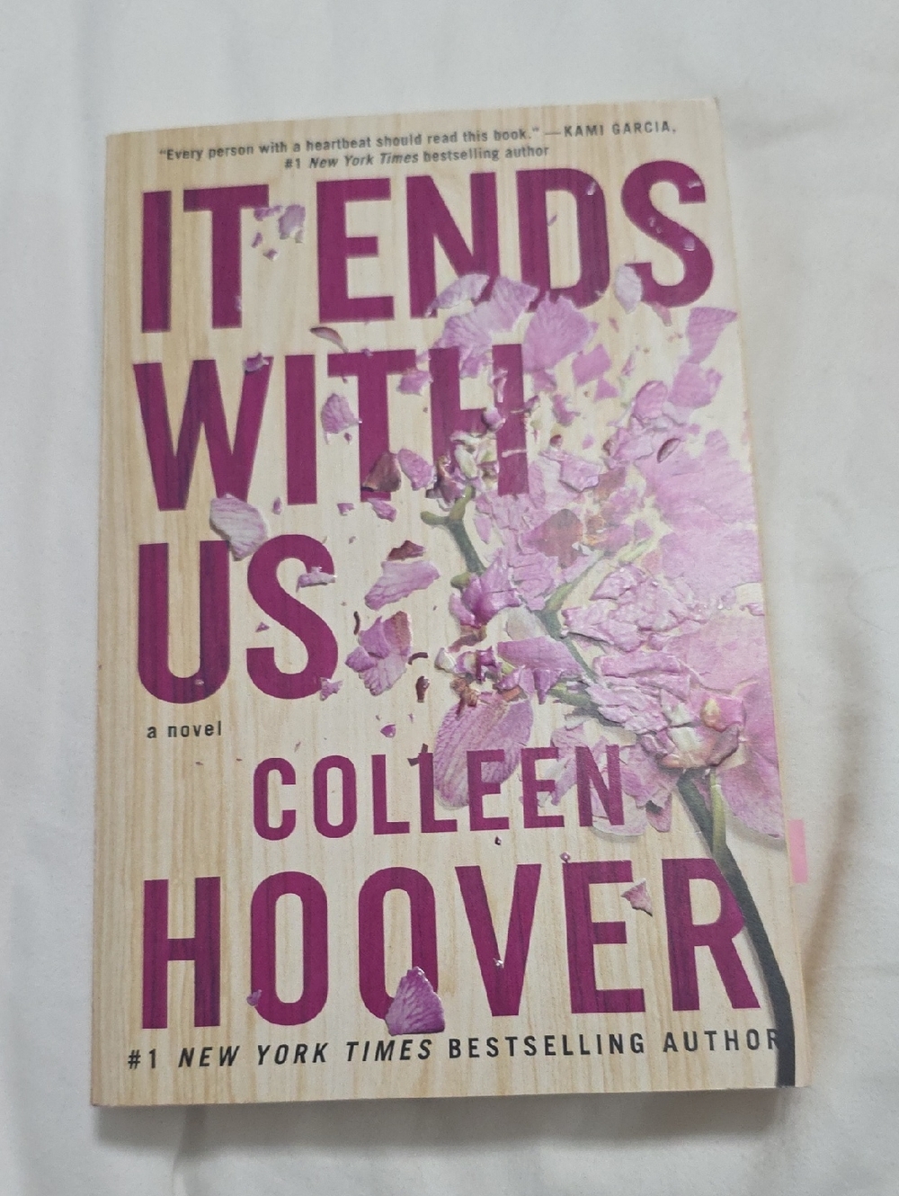 "It Ends With Us" - Pink Paperback Novel